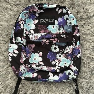 Jansport Superbreak black floral backpack